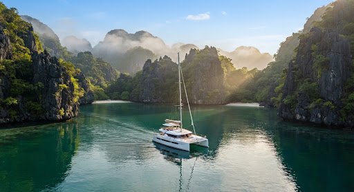 Private catamaran in a quiet El Nido lagoon